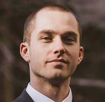 Analista de trading experto en el mercado cripto, Thomas Whitfield, headshot.
